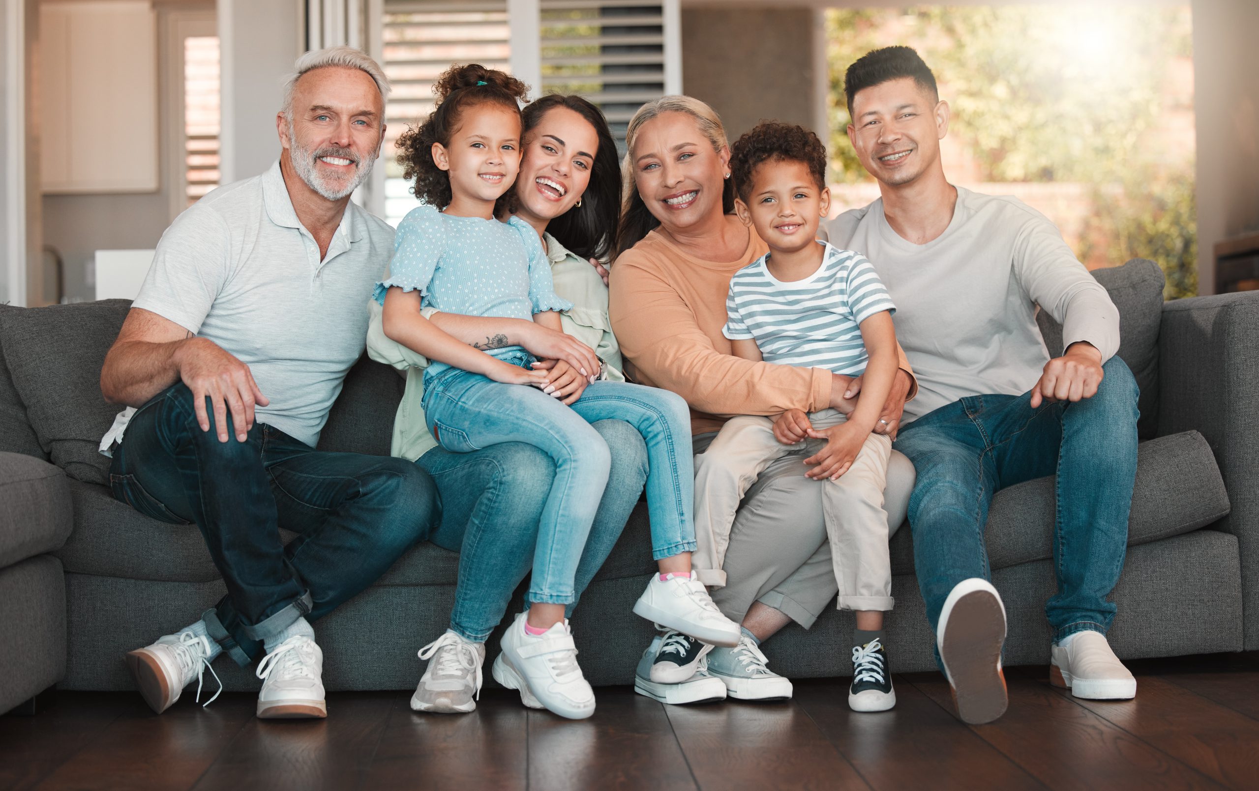 Were in a room full of love. Shot of a family spending time together at home FAQ image of a happy family